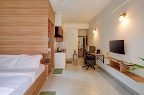 Premium bedding, individually furnished, desk, laptop workspace