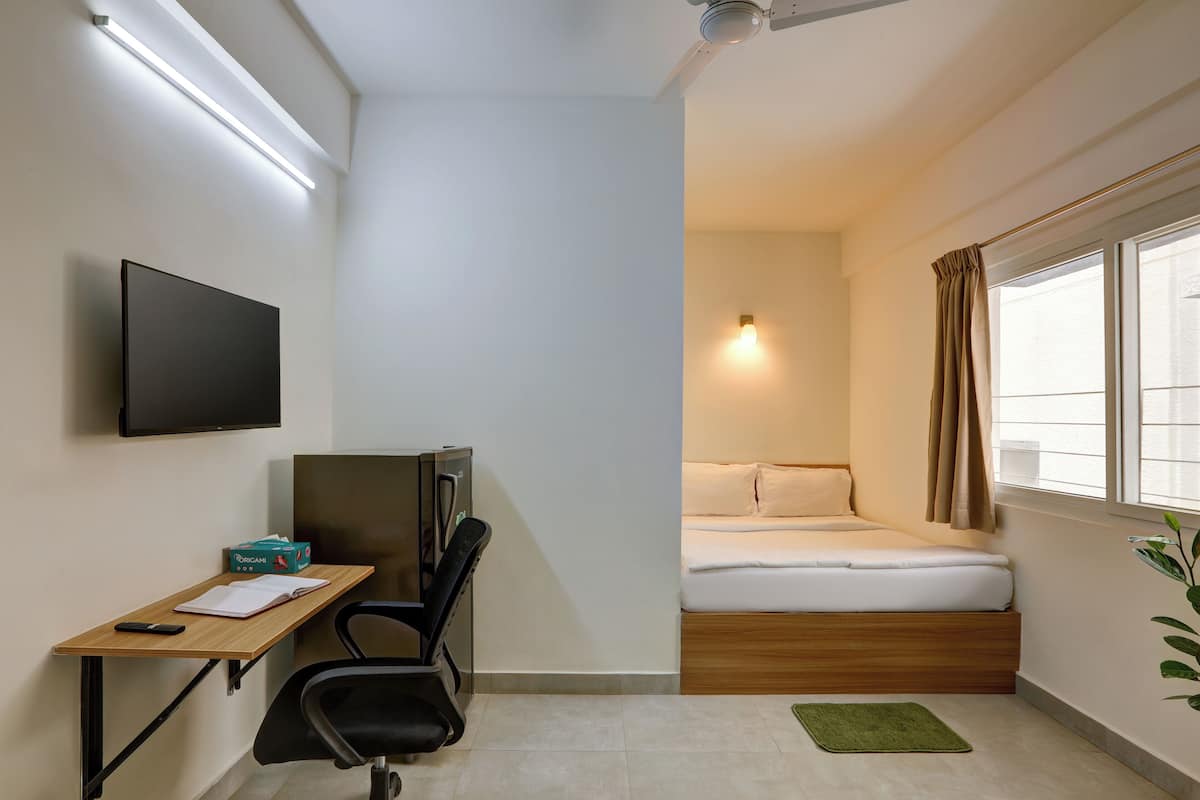 Premium bedding, individually furnished, desk, laptop workspace