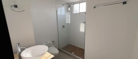 Shower, towels, soap, toilet paper