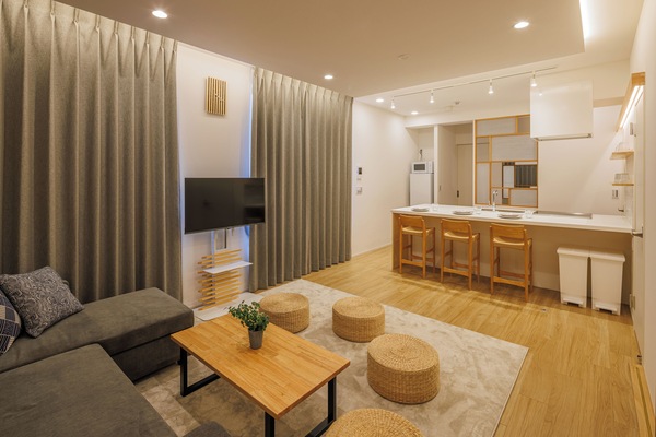 Premium Condo | Living area | 50-inch flat-screen TV with digital channels