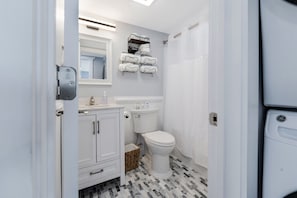 Hair dryer, towels, soap, shampoo