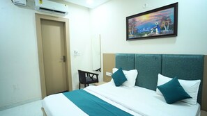Deluxe Room, 1 Bedroom, City View | Laptop workspace, iron/ironing board, free WiFi, bed sheets - Hotel Shri Radha Sneh Mathura (Mathura)