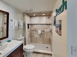 Shower, hair dryer, towels, soap