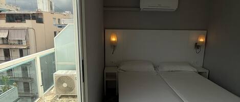 Double or Twin Room | Desk, bed sheets