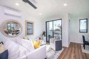 TV, fireplace, books, offices