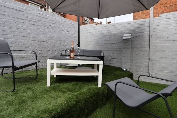 Outdoor seating area with umbrella