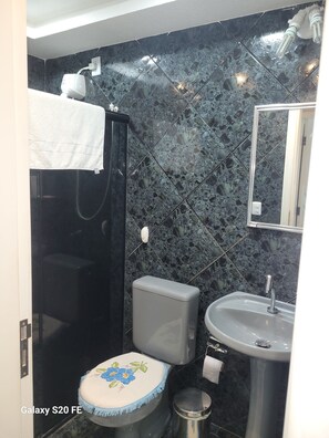 Shower, towels, soap, toilet paper
