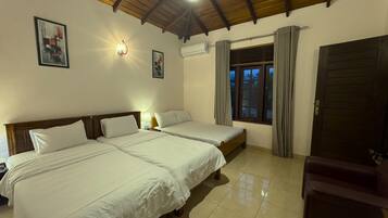 Family Triple Room, Multiple Beds, Mountain View | Egyptian cotton sheets, premium bedding, down comforters