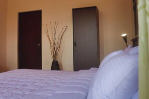 Egyptian cotton sheets, premium bedding, down duvets, memory-foam beds