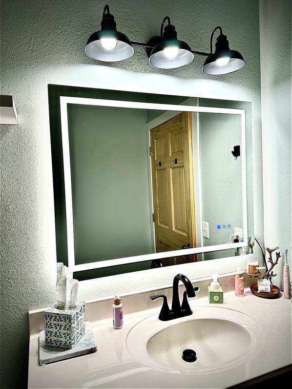 Shower, eco-friendly toiletries, hair dryer, towels