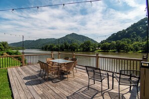 Outdoor dining - Riverfront house, Deck over river, Dock, Bar, gazebo, scenic view, pets welcome. (Montgomery)