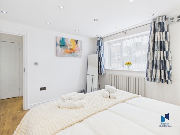 Iron/ironing board, travel crib, free WiFi, bed sheets