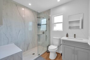 Shower, hair dryer, towels, soap