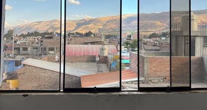 Travel's _house in Cupaca has a shared living room and kitchen. For all V