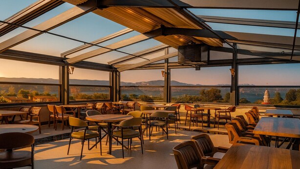 An outdoor dining area with tables and chairs, large windows, and a view of the landscape. - Rest by Dedeman Sapanca (Sapanca)
