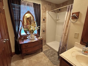 Shower, hair dryer, towels, soap