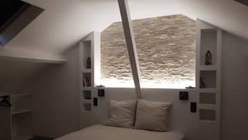 1 slaapkamer, een strijkplank/strijkijzer, beddengoed