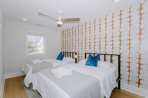 4 bedrooms, desk, iron/ironing board, travel crib