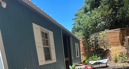 Chic tiny house with 2 bedrooms and 2 bathrooms. Perfect for an overnight stay.