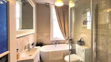 Shower, eco-friendly toiletries, hair dryer, bidet