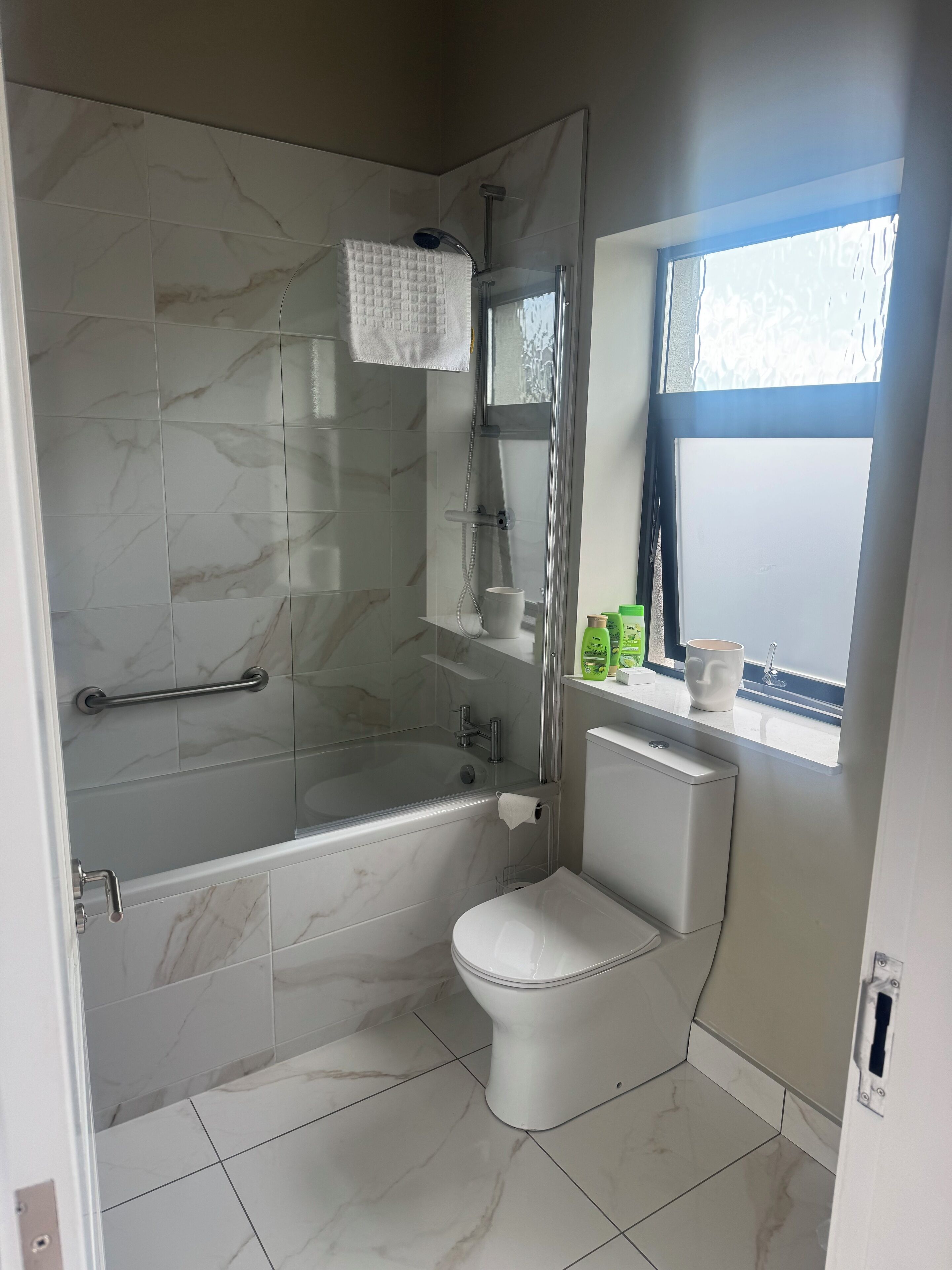 Eco-friendly toiletries, hair dryer, towels, soap