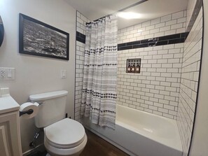Hair dryer, towels, soap, toilet paper