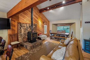 Smart TV, fireplace, books