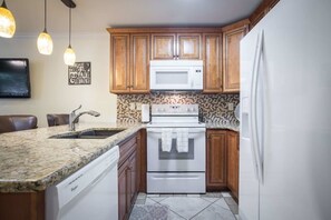 Condo, Multiple Beds, Balcony, Garden View (Waterwheel Hideaway) | Private kitchen