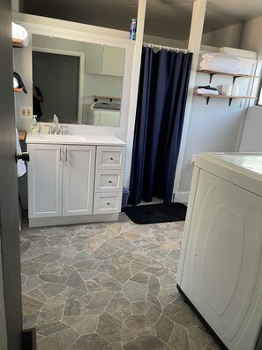 Jetted bath, hair dryer, towels, soap