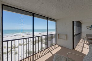 A balcony with a view of the beach and ocean. - Sea Oats 352 | 2BR/2BA Gulf-Front Luxury Retreat (Boca Grande)