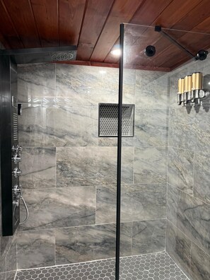 Shower, hair dryer, towels, soap