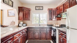 Apartment, 2 Bedrooms, Garden Area | Private kitchen | Full-size fridge, microwave, oven, stovetop - Brytan villa (Treasure Beach)