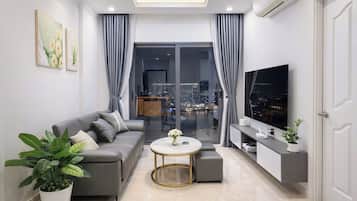 City Apartment, 2 Bedrooms, Balcony, River View | Living area | 43-inch Smart TV with cable channels
