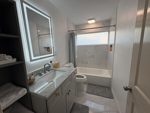 Shower, hair dryer, towels, soap - Updated Westbury Getaway Gem - 3 bedroom oasis (Houston)