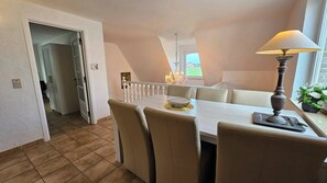 Shared Dormitory, 1 Bedroom, Patio, Garden View | Dining room