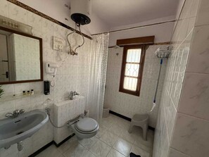 Hair dryer, towels, soap, toilet paper
