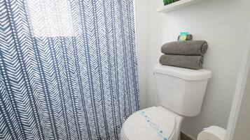 Hair dryer, towels, soap, toilet paper