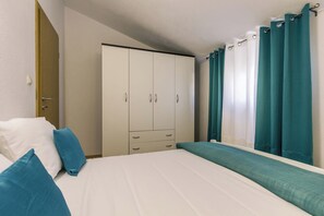 2 habitaciones, tabla de planchar con plancha, wifi y ropa de cama 