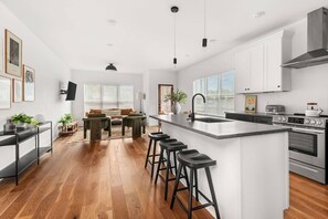 Fridge, microwave, dishwasher, coffee/tea maker