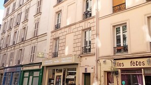 A multi-story building with a bookstore, a restaurant, and a library.