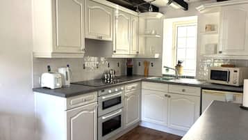 Fridge, oven, cookware/dishes/utensils