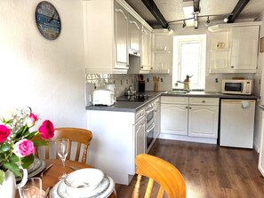 Fridge, oven, cookware/dishes/utensils