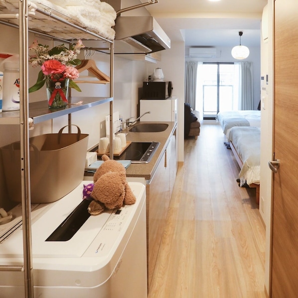 Memory foam beds, desk, laptop workspace, blackout drapes