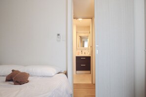 Memory-foam beds, desk, laptop workspace, blackout curtains