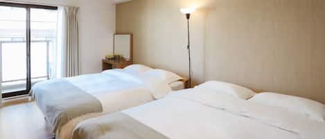 Memory-foam beds, desk, laptop workspace, blackout curtains