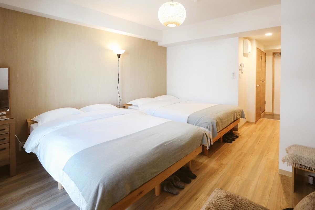 Memory foam beds, desk, laptop workspace, blackout drapes