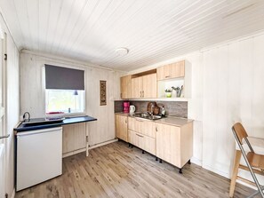Fridge, microwave, cookware/dishes/utensils