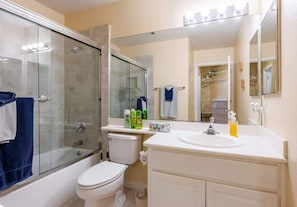 Shower, hair dryer, towels, soap