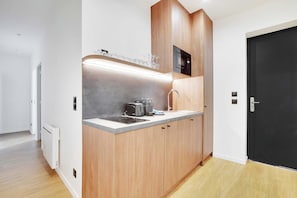 Fridge, microwave, stovetop, coffee/tea maker