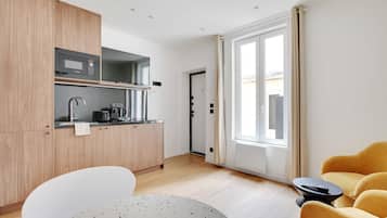 Fridge, microwave, stovetop, coffee/tea maker